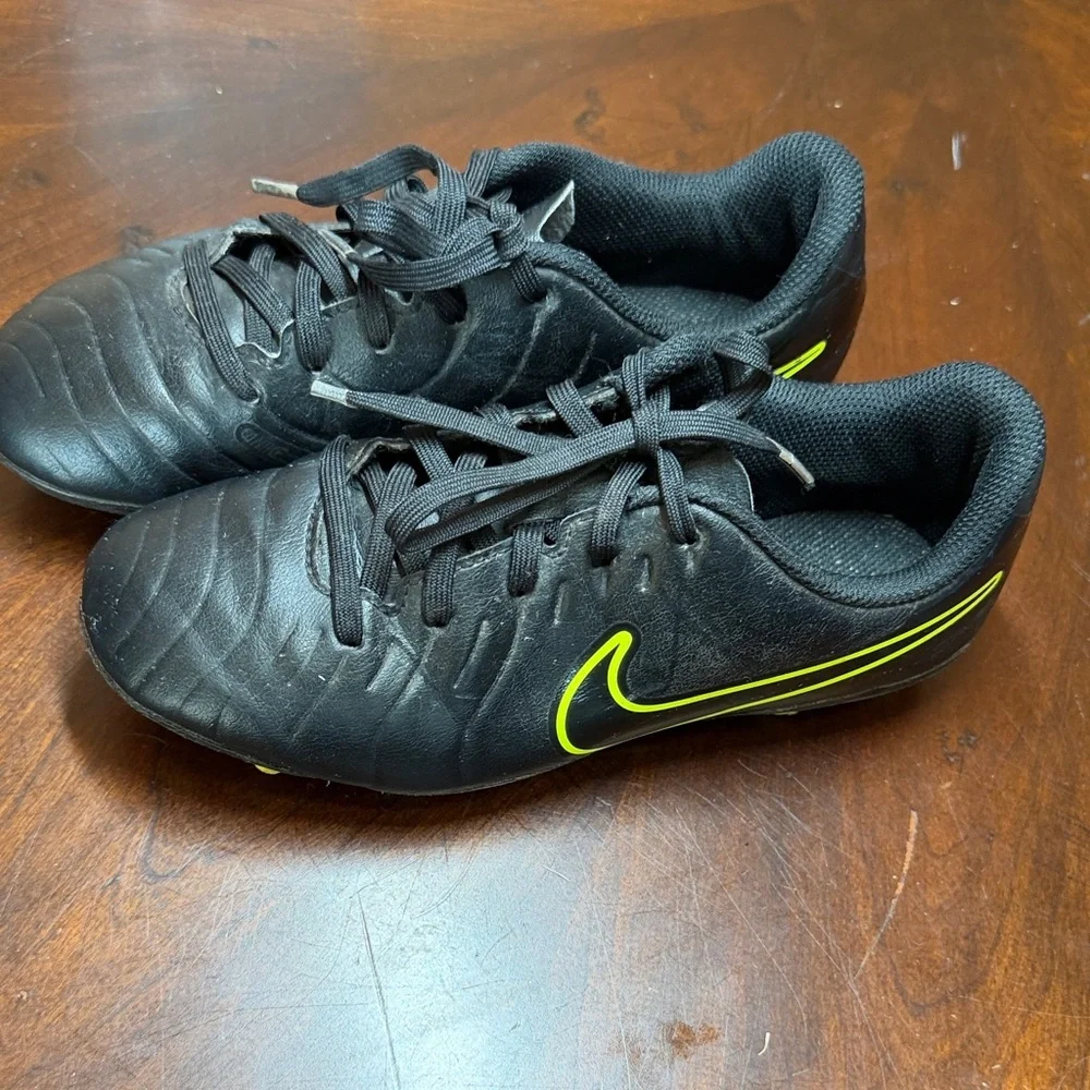 Nike Black Soccer Cleats with Yellow Accents